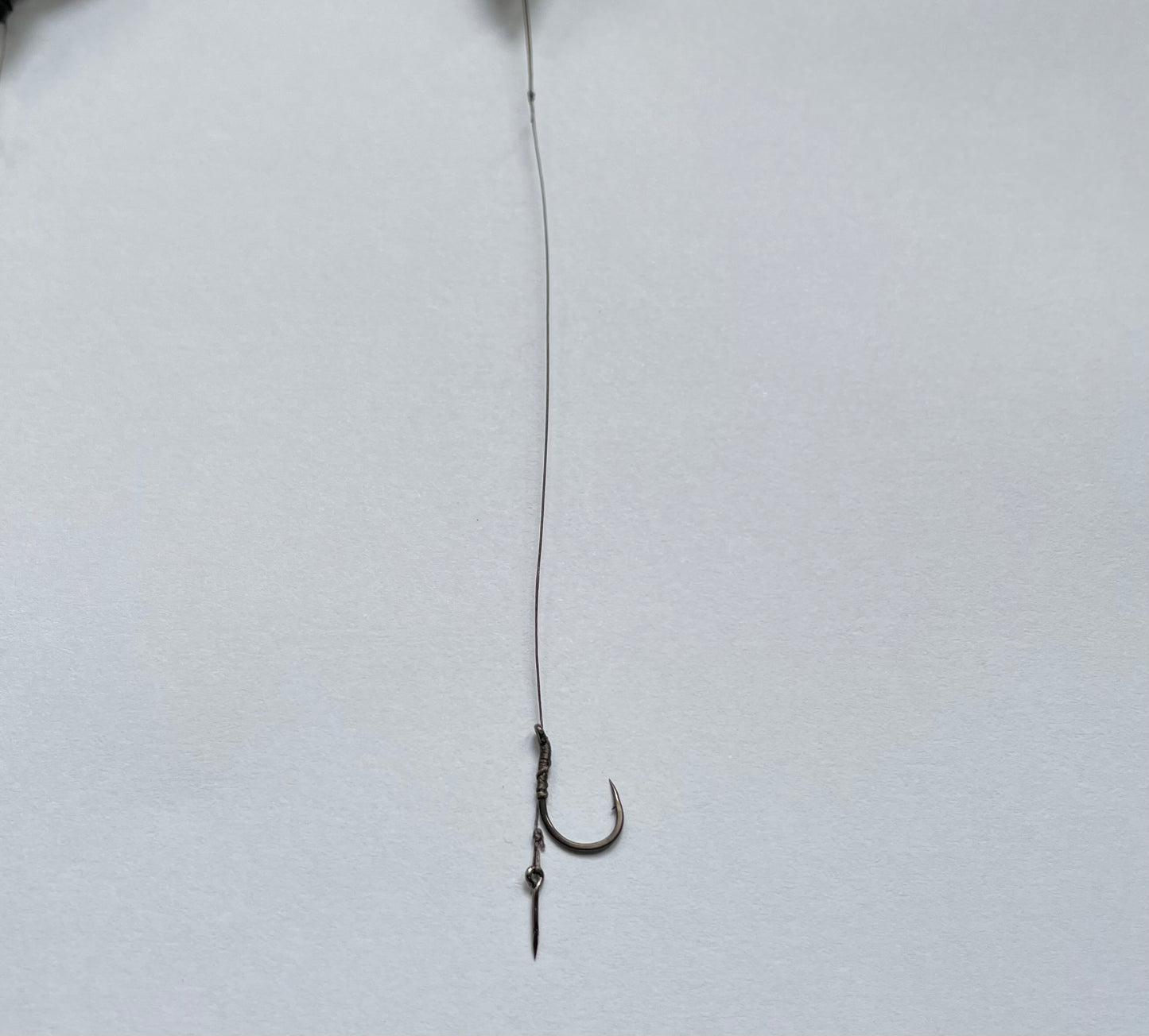 Montura method feeder long cast si carlig legat cu spin de momeala